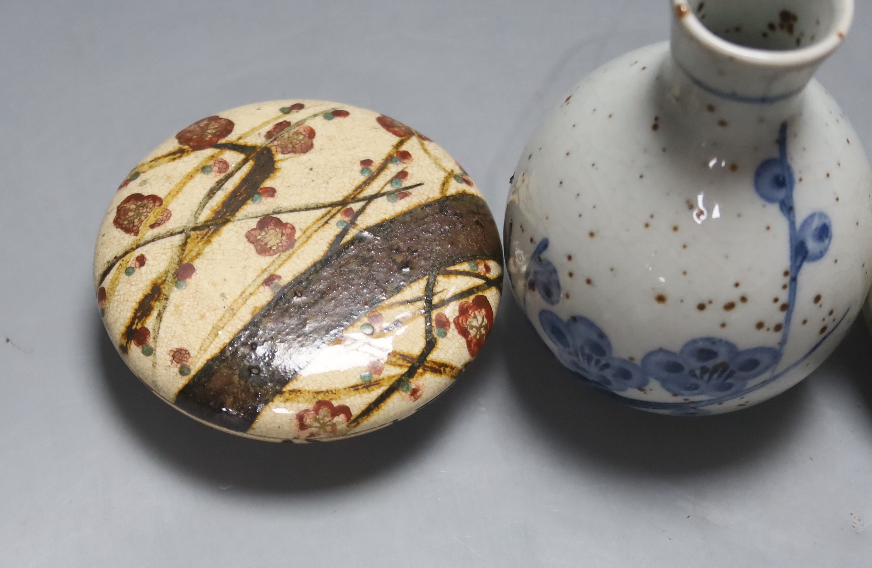 Two Japanese ceramic water droppers and a stoneware box and cover, in the style of Ogata Kenzan, old collection label, tallest 11cm